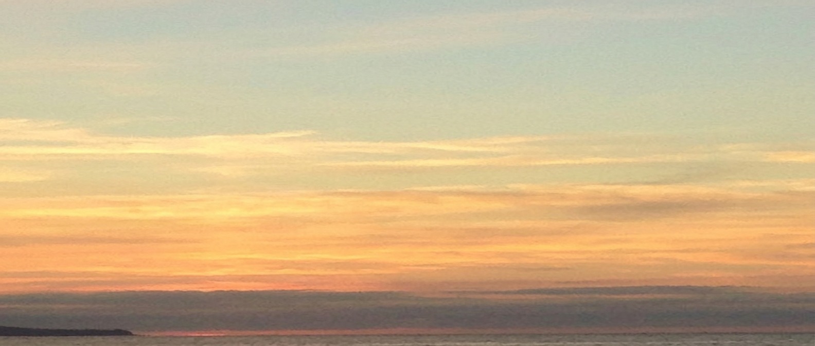Watchmen Consulting lookout and ship's wheel emblem against a sunset